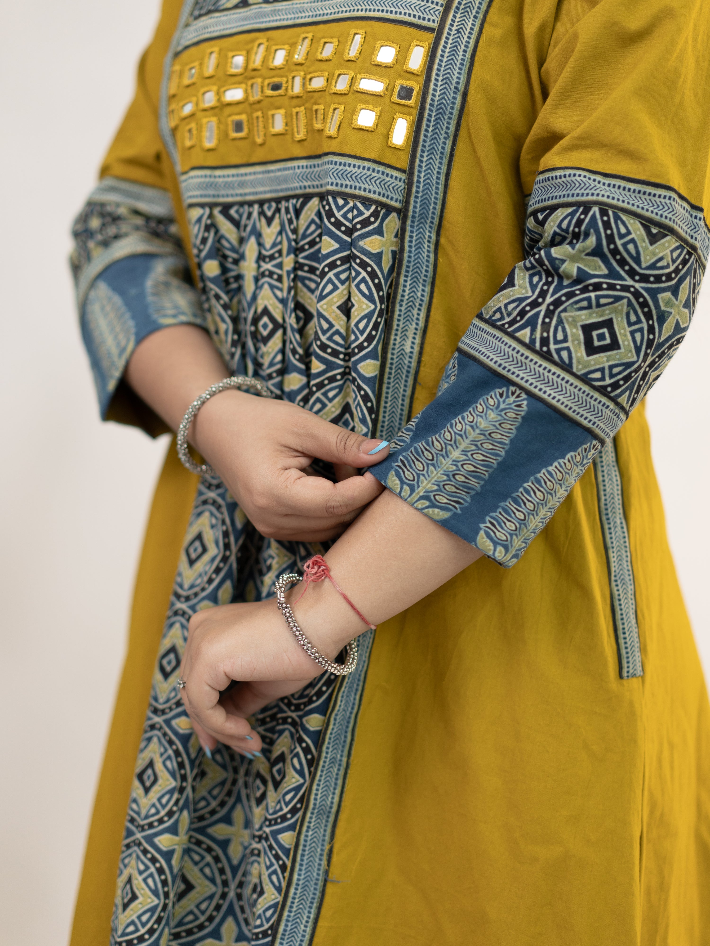 Diyara Mustard Cotton Ajrakh Kutch Embroidered A-line Kurta