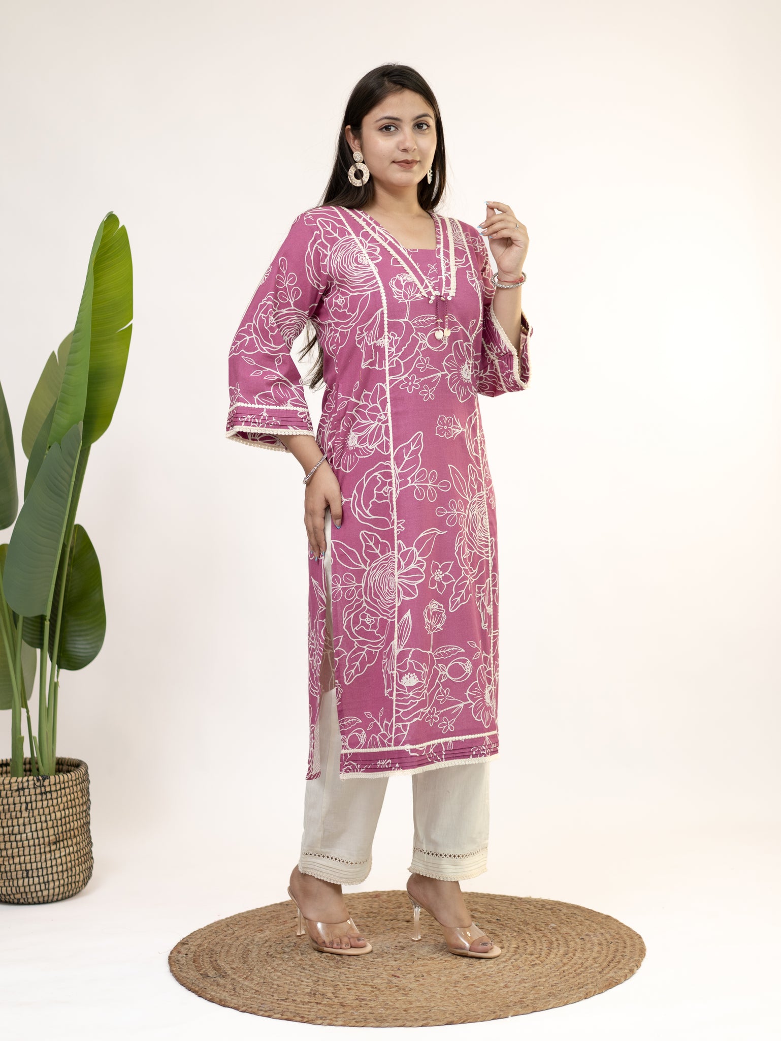 Pink kurti paired with white pants