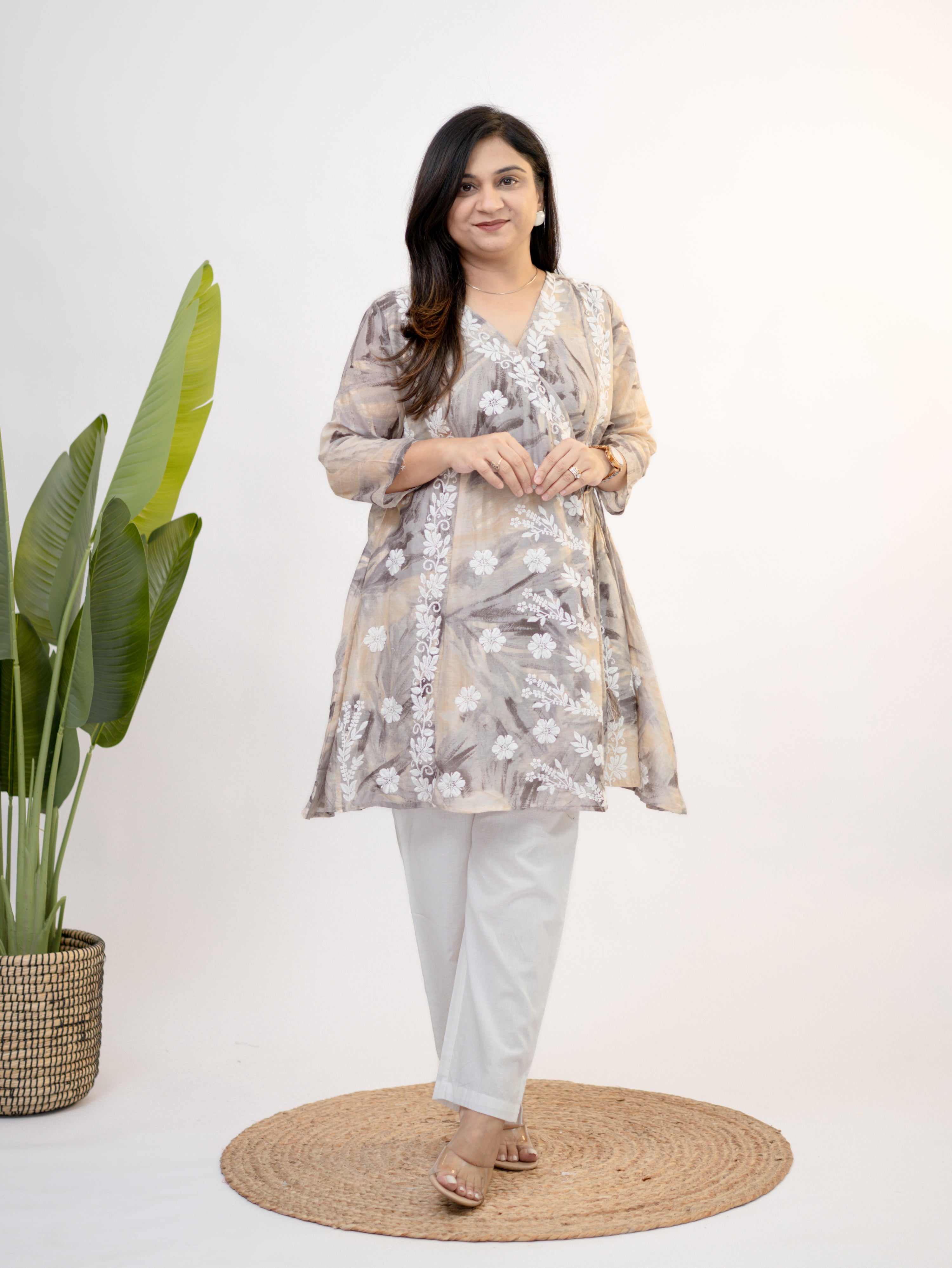 Fara mul cotton chikankari work A-line coord set for women in soft beige floral print with white straight pants