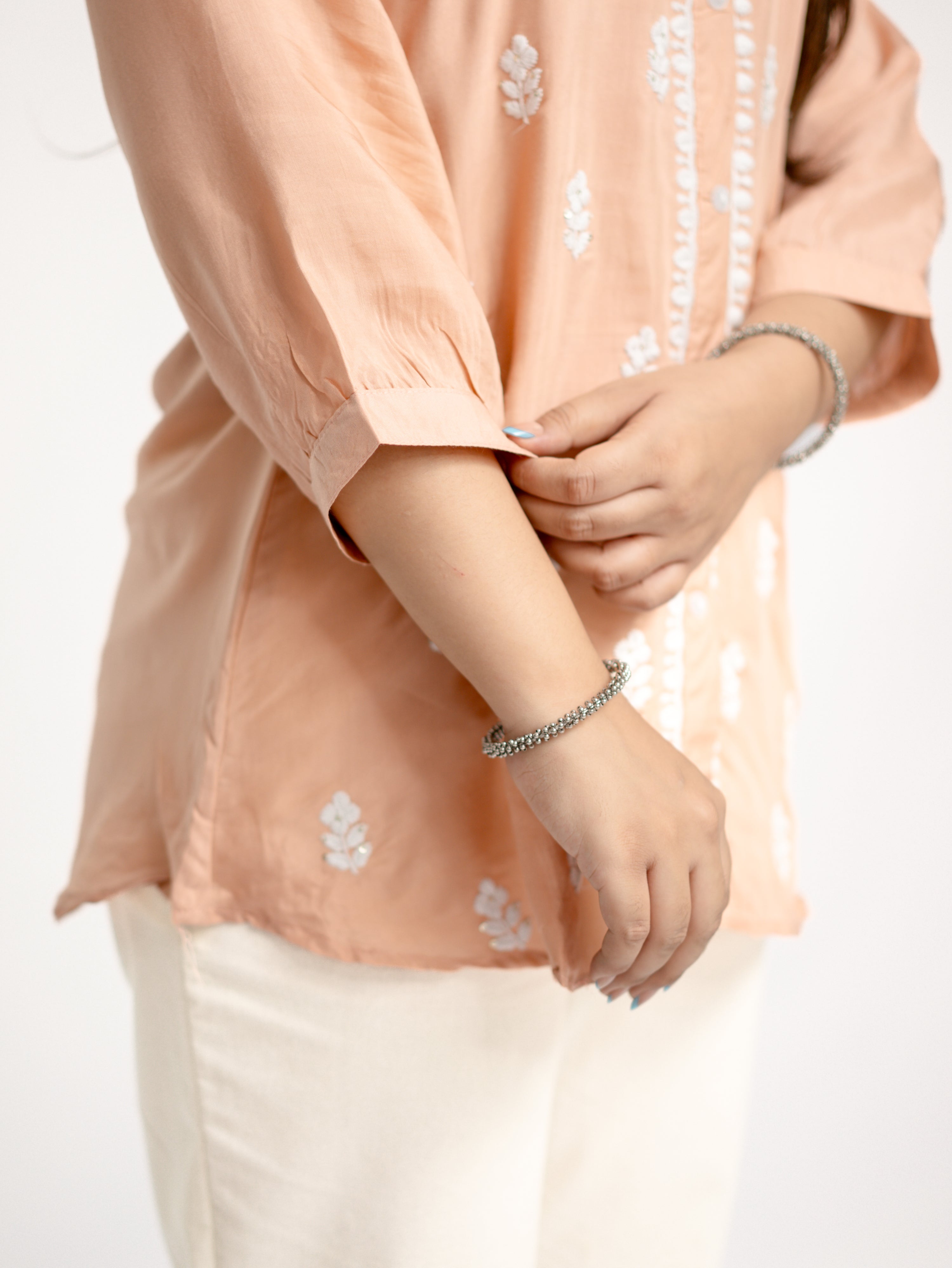 Sirya Peach Muslin Lucknowi Embroidered Short Top