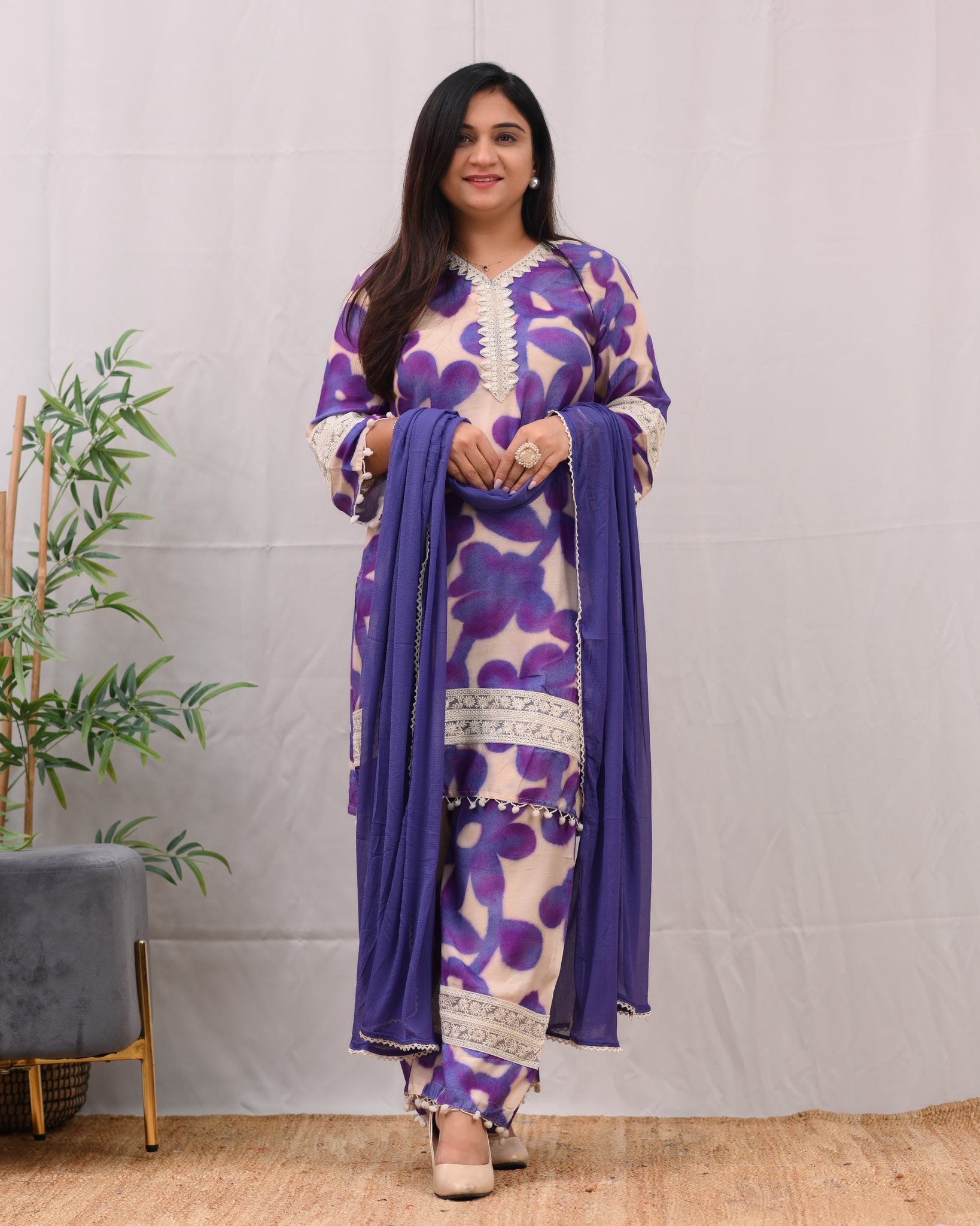 Purple kurti paired with white pants